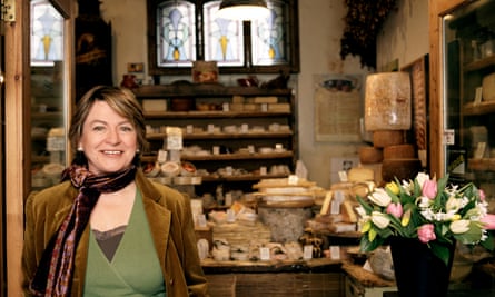 Sheila Dillon standing in a food shop.
