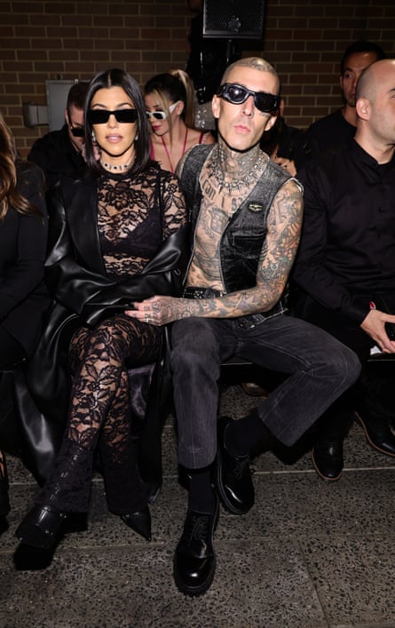 Kourtney Kardashian Barker and Travis Barker at her Boohoo by Kourtney Kardashian Barker’s New York fashion week debu, September 2022.