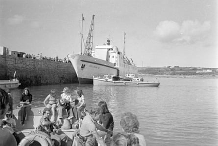 Black and white image of people queueing for the Scillonian III