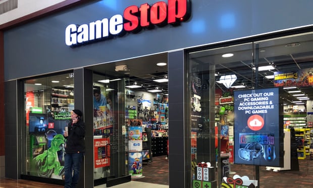 A man talks on a phone outside a GameStop store in Gurnee, Illinois, US