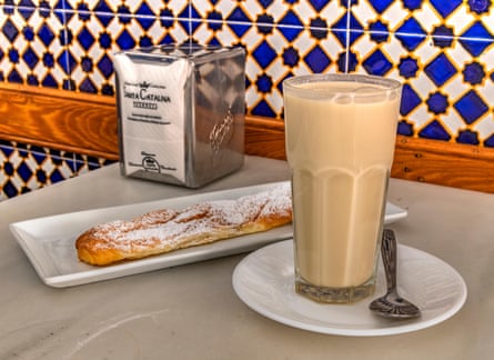 Glass of Horchata and farton sweet.