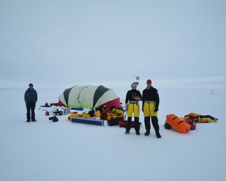 Field camp and expeditioners on the Totten glacier during data retrieval and resetting of field monitoring equipment.
