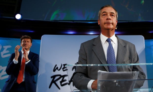 The Brexit party chairman, Richard Tice, applauds Nigel Farage at a press conference in August 2019