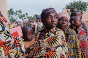 Voters in colourful outfits in queue