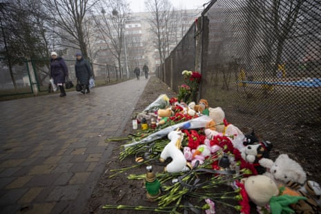 Flowers laid at the scene after the helicopter crash yesterday.