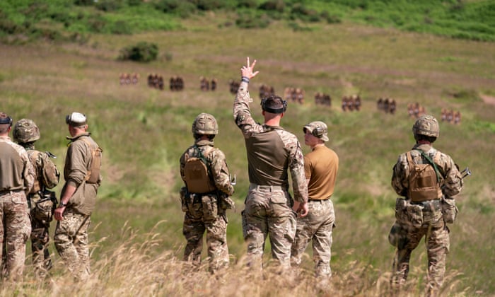 New recruits to the Ukrainian army being trained by UK armed forces personnel at a military base near Manchester.