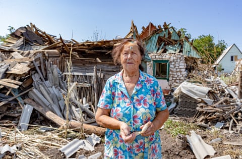 Valentina, 75, surveys the wreckage of her home in Kramatorsk, Ukraine, after a Russian missile strike.