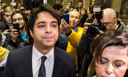 Jian Ghomeshi leaves court after getting bail on multiple counts of sexual assault in 2014.