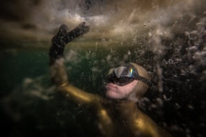 A diver demonstrates a layer of marine mucilage known as 'sea snot'