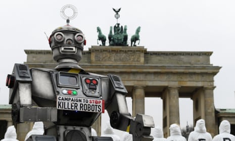 Activists from the Campaign to Stop Killer Robots, a coalition of non-governmental organisations opposing lethal autonomous weapons or so-called 'killer robots', stage a protest at Brandenburg Gate in Berlin, Germany, in March 2019. 