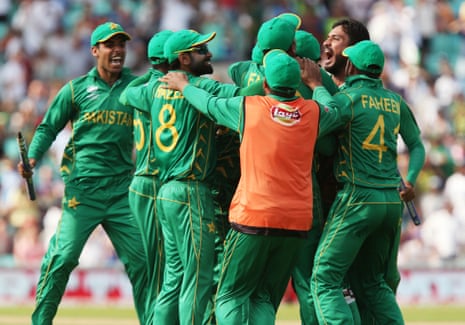 Pakistan celebrate winning the match.