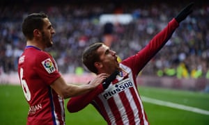 Antoine Griezmann strikes a pose as he celebrates after scoring the opening goal against Real Madrid.
