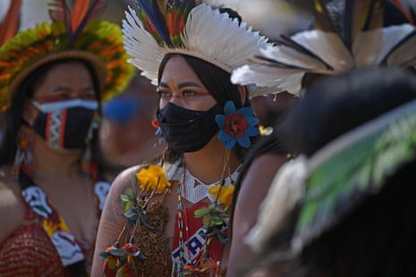 An indigenous woman from the Pataxo tribe is seen during a demonstration for the demarcation of indigenous land in Brasília on Thursday.