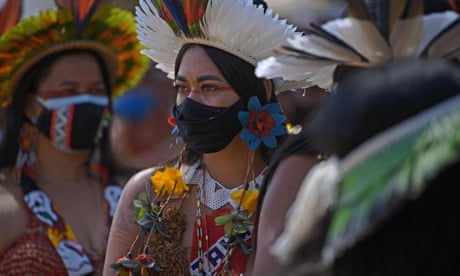 BRAZIL-POLITICS-INDIGENOUS-DEMONSTRATION-LAND-DEMARCATION<br>An indigenous woman from the Pataxo tribe is seen during a demonstration for the demarcation of indigenous land in Brasilia, on September 8, 2021. - The Supreme Federal Court of Brazil (STF) resumes this Wednesday a trial that could put in check hundreds of indigenous lands pending demarcation in the country. (Photo by CARL DE SOUZA / AFP) (Photo by CARL DE SOUZA/AFP via Getty Images)