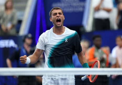 Flavio Cobolli celebrates after winning his first round match against Francisco Comesana.