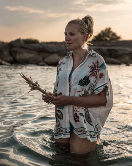 Camille Voitot makes an offering to nan oversea for her boy Marlow, who died during a freebirth.