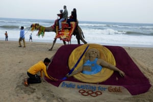 Back in India; over on Puri beach; sand artist Manas Sahoo is cheering on Neeraj Chopra.