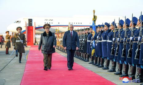 Russian defence minister Andrei Belousov, centre, with his North Korean counterpart, No Kwang Chol, centre left, during his welcome on arrival at Pyongyang airport on Friday.