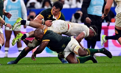 England’s Tom Curry is tackled by Bongi Mbonambi of South Africa during their World Cup semi-final