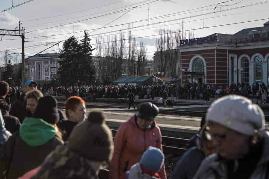 Civilians gather at the train station to be evacuated from combat zones in Kramatorsk on 6 April.