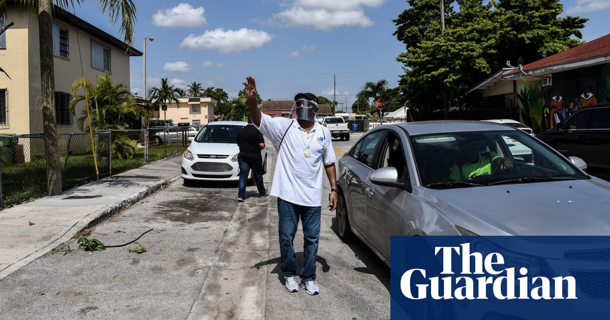 Global report: US reports another record increase in coronavirus cases - The Guardian