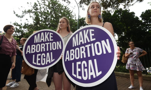 Abortion pro-choice supporters rally outside the Queensland Parliament.