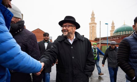 George Galloway greeting people in Rochdale.