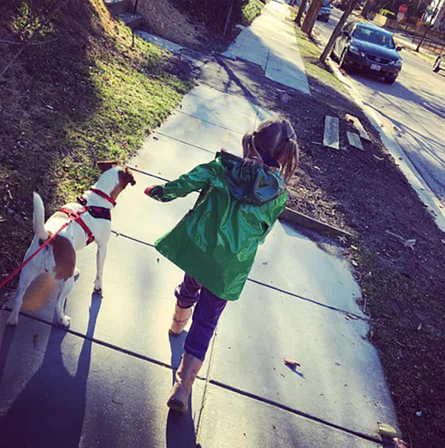 Luna with one of her family members, a girl in a green coat