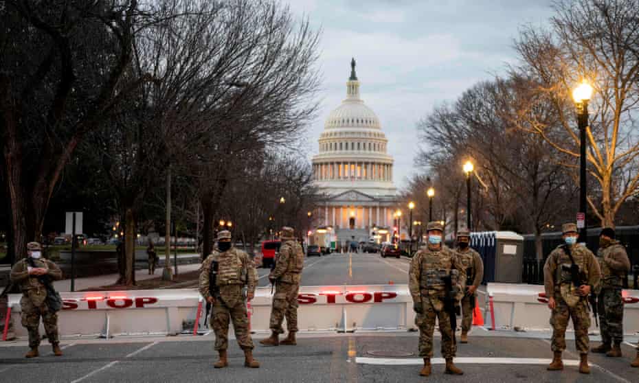 The scene in Washington on Sunday. At least two active-duty service members or national guard members have been arrested in connection with the Capitol assault.