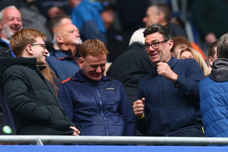 Andy Burnham chatting to fellow Everton fans in the stand