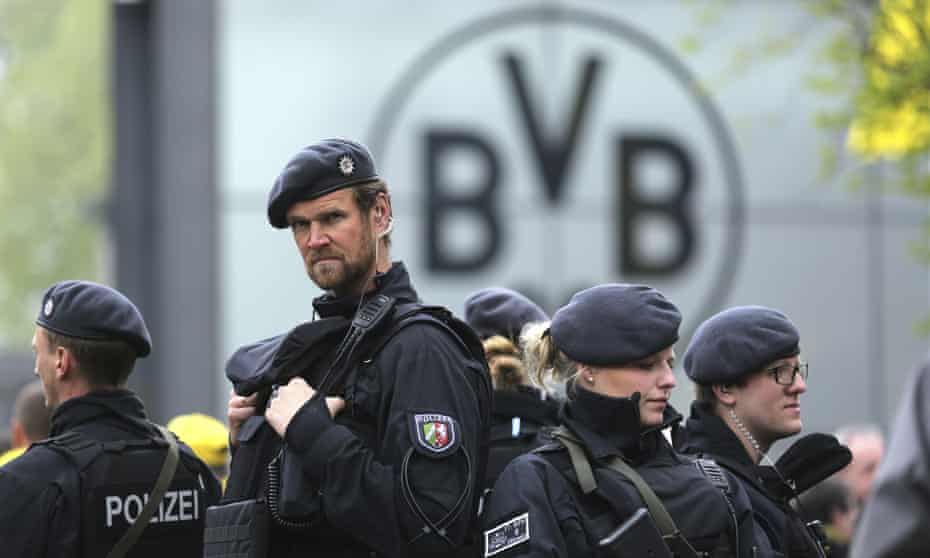 Police guard the entrance of the Dortmund stadium.