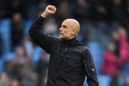 Pep Guardiola raises his fist