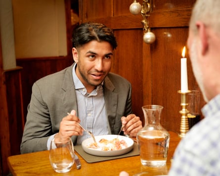 Fraz chatting at a restaurant table