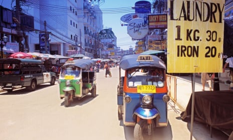 Tuk Tuks on a busy toutist street in Thailand