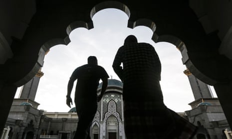 Malaysian Muslims pray to celebrate the holy month of Ramadan