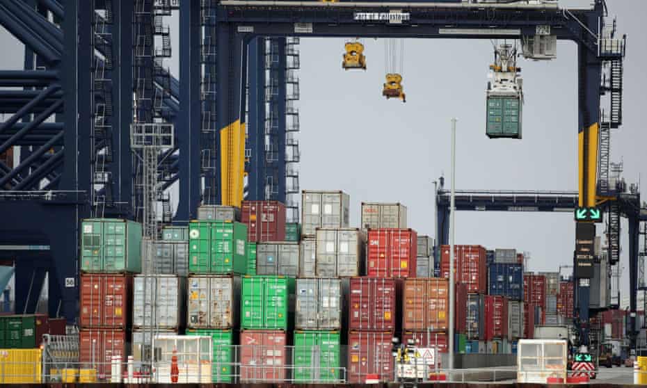 Containers being stacked in automated process at the port of Felixstowe, Suffolk