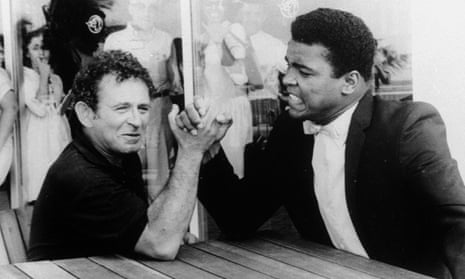 Norman Mailer arm wrestling with Muhammad Ali, 1 August 1965