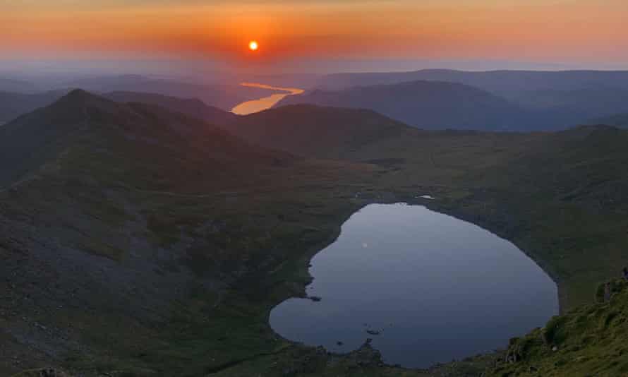 The sun rising over Red Tarn, seen from the top of Helvellyn.