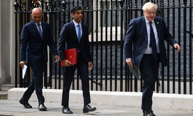 Sajid Javid, Rishi Sunak and Boris Johnson in Downing Street in September 2021.