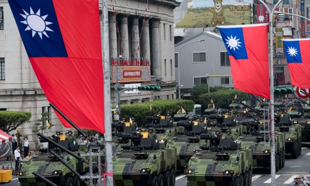 Armoured vehicles parade in front of Taiwan's Presidential Palace in downtown Taipei on the occasion of the 105 years celebration of the founding of the Republic of China.