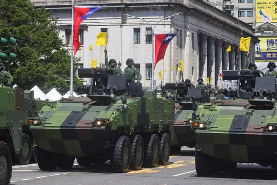 Army vehicles participate in national day celebrations in Taipei.