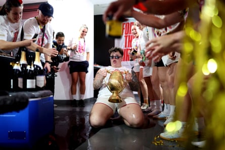 Celebrations in the dressing room, led by Hannah Botterman, as England win the Women’s Rugby World Cup