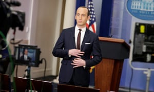 Stephen Miller waits to go on the air in the White House briefing room in Washington on Sunday.