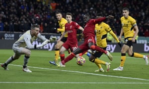 Wolverhampton Wanderers’ goalkeeper Jose Sa makes a save in front of Liverpool’s Sadio Mane.