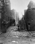 Slum housing in London, circa 1900. The eradication of extreme poverty is a key factor in controlling TB.