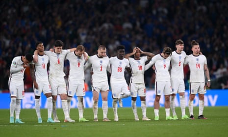 The England players look on during the penalty shootout for Euro 2020