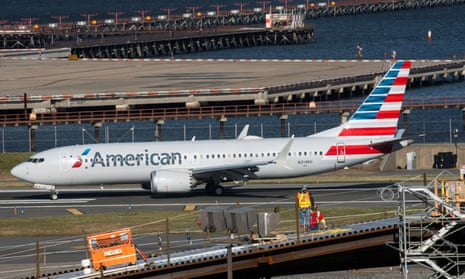 American Airlines flight 718, the first US Boeing 737 Max commercial flight since regulators lifted a 20-month grounding in November, lands at LaGuardia airport in New York, on Tuesday.