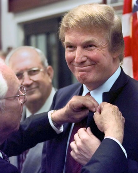 Donald Trump receives a brigade pin at the Bay of Pigs museum, on 15 November 1999.