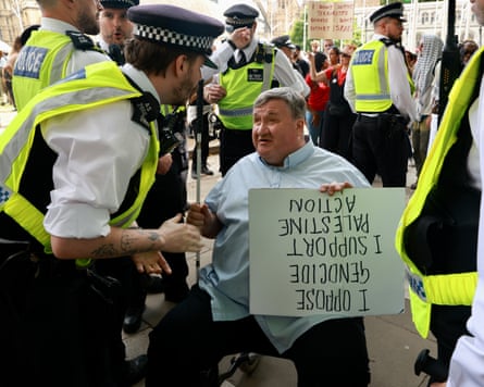 Mike Higgins during his arrest on 9 August.