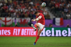 Wales’ fly-half Dan Biggar kicks off.